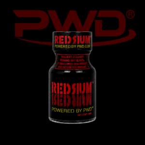 Promotional image of a small black bottle of PWD Redrum solvent cleaner with bold red ‘REDSRUM’ branding, yellow ‘Powered by PWD’ text, and warning labels, displayed against a black background with a large red PWD logo